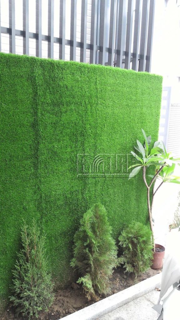 Artificial turf wall landscape